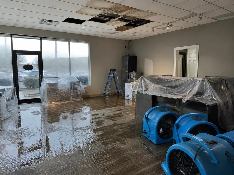 Water damage restoration underway inside a commercial property