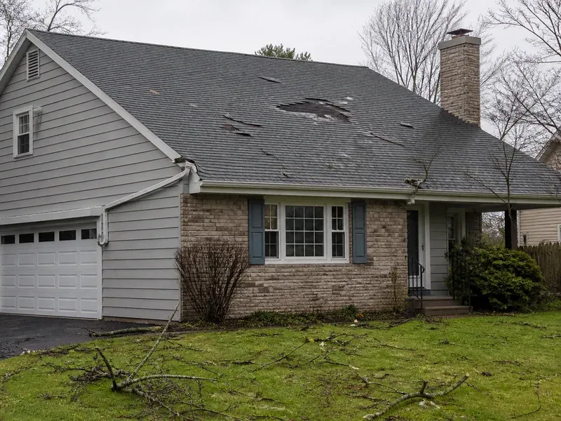 Storm and wind damage to the roof of a residential property