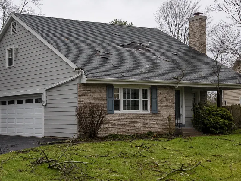 Storm and wind damage to the roof of a residential property